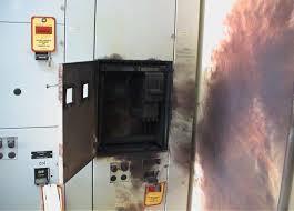 Fire damage inside an electrical control panel compartment
